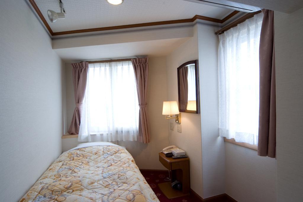 Beppu Station Hotel Værelse billede